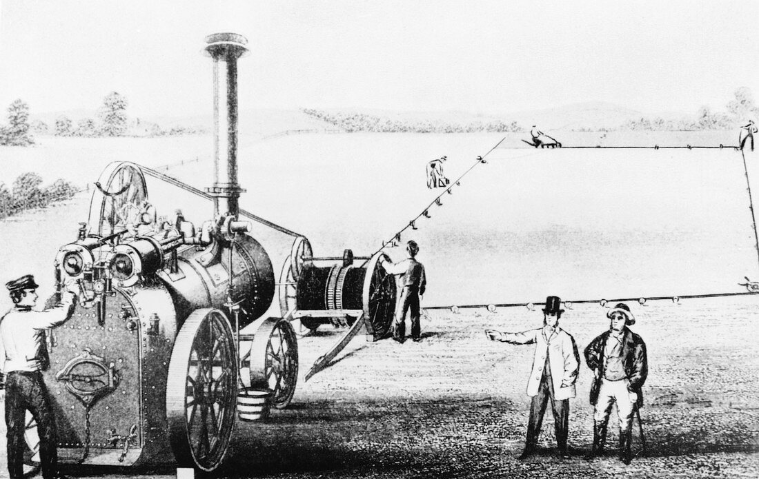 Illustration of steam engine powering a plough