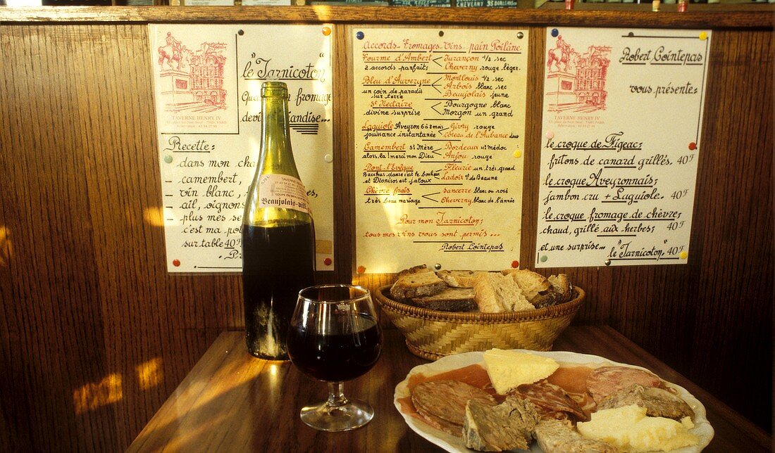 Wine and cheese - specialities at "Taverne Henry IV" in Paris