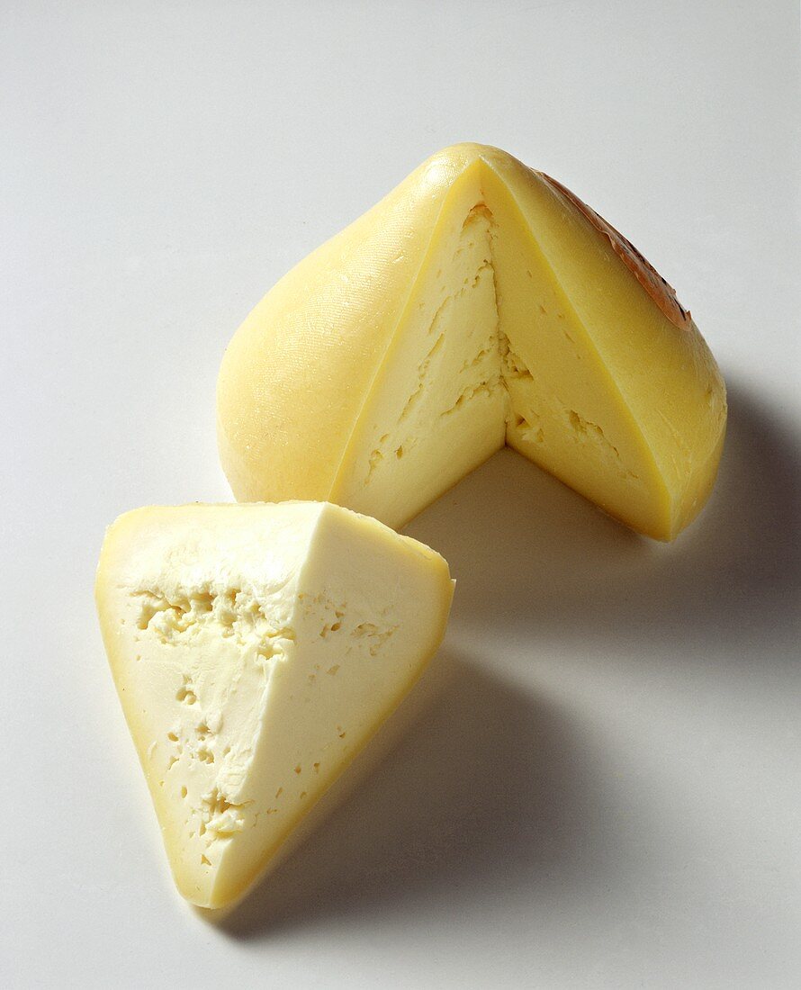 A tetilla cheese, cut into