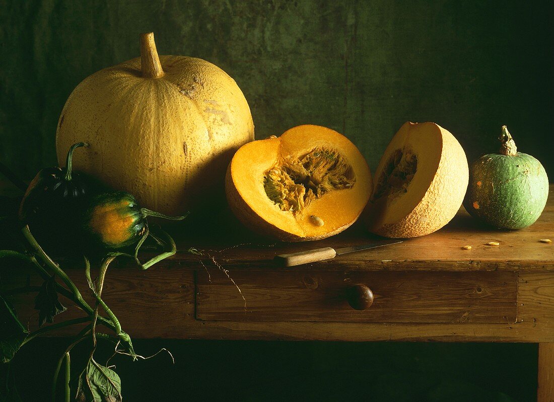 Still Life of Assorted Pumpkins and Squash on a Table