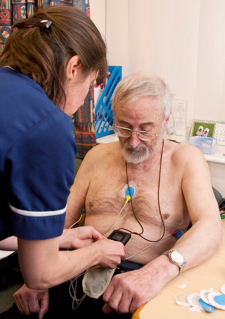 Ambulatory ECG being fitted