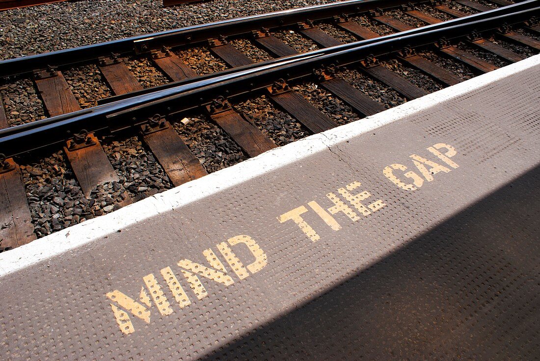 Mind the gap warning sign at rail station
