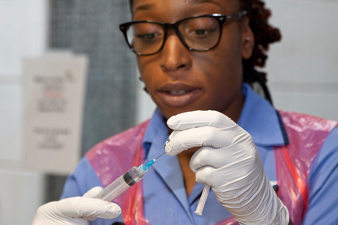 Nurse preparing an injection