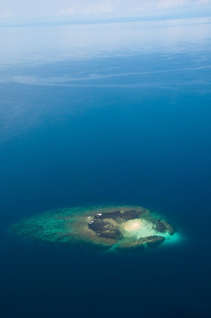 Small atoll viewed from airplane