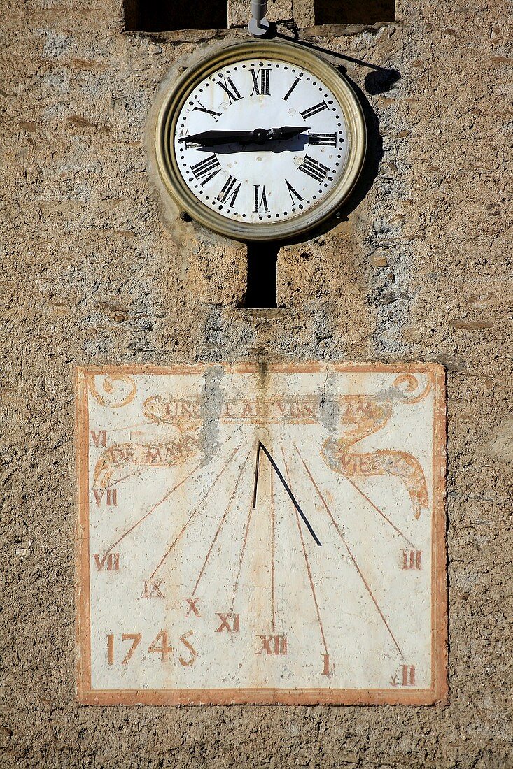 Sundial and clock on a church