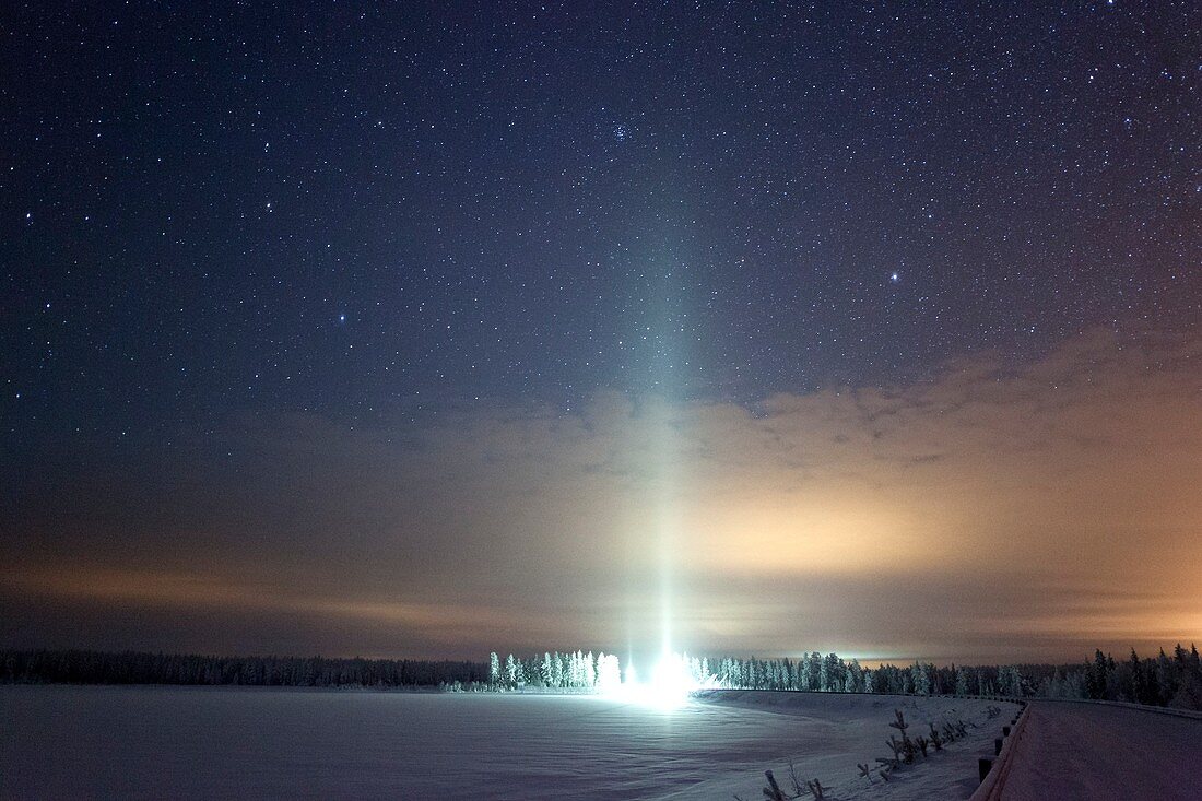 Ice pillar in night sky