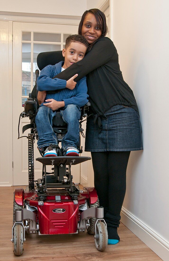 Mother with child with muscular dystrophy