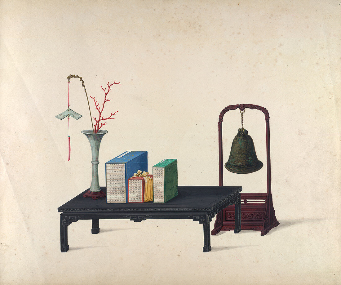 A vase,table and bell