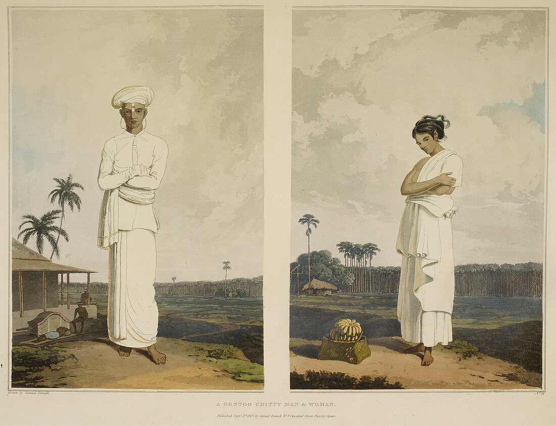 Man wearing turban,woman in white sari