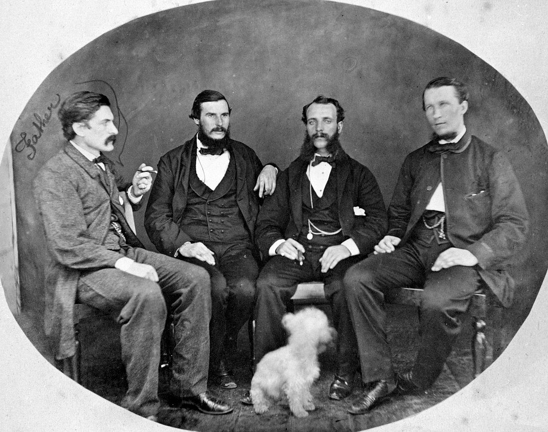 Group of railway engineers,and a dog