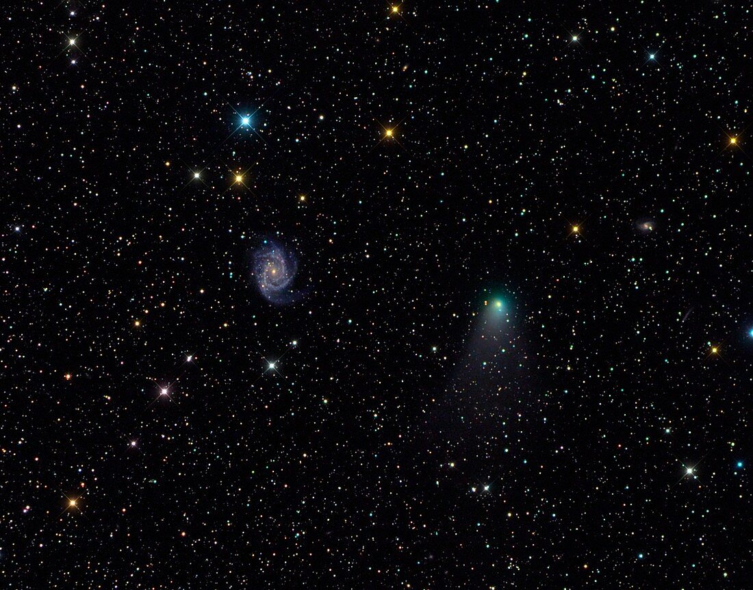 Galaxy NGC 2997 and comet C2012 V2