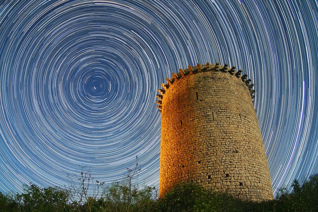 Polar star trails over tower