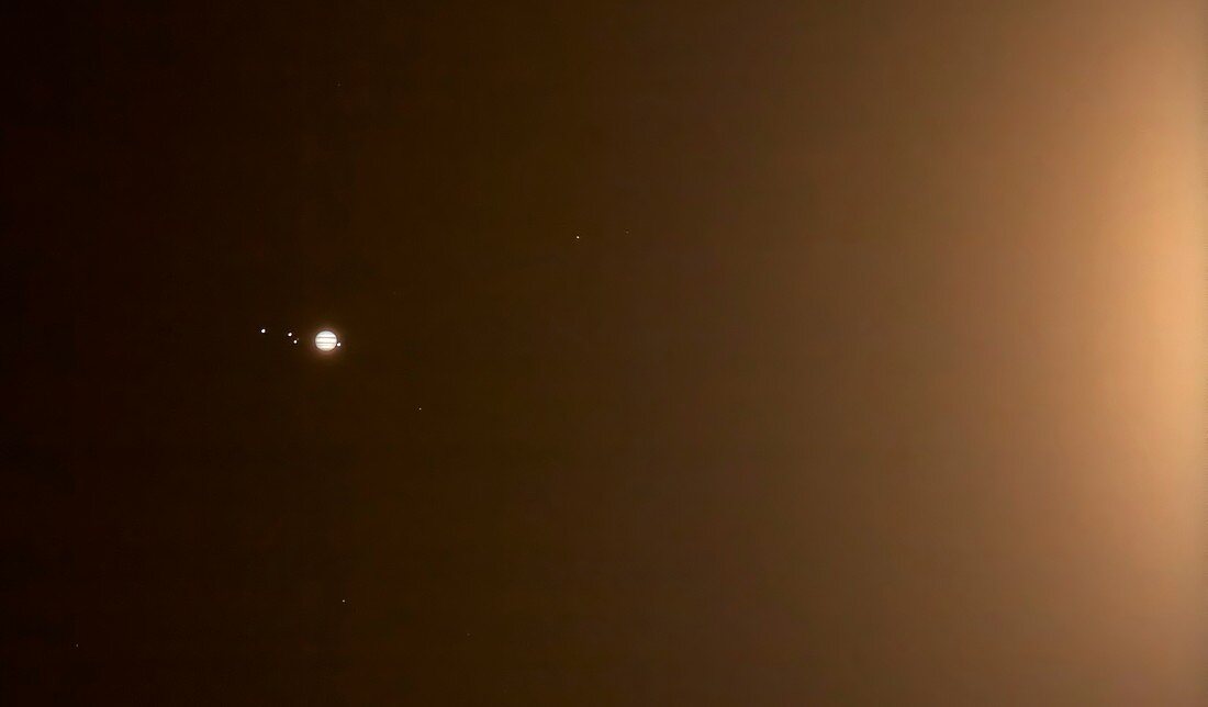 Jupiter in the glow of the Moon