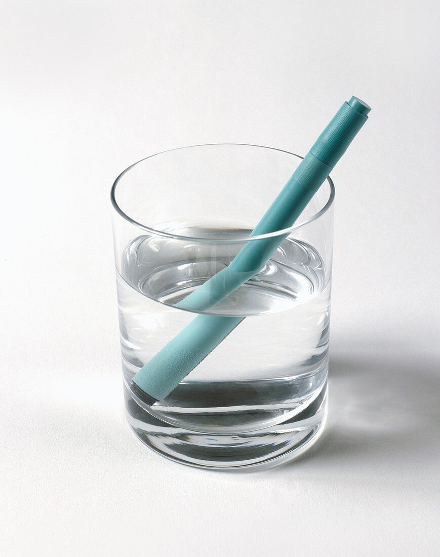 Felt tip pen in glass of water