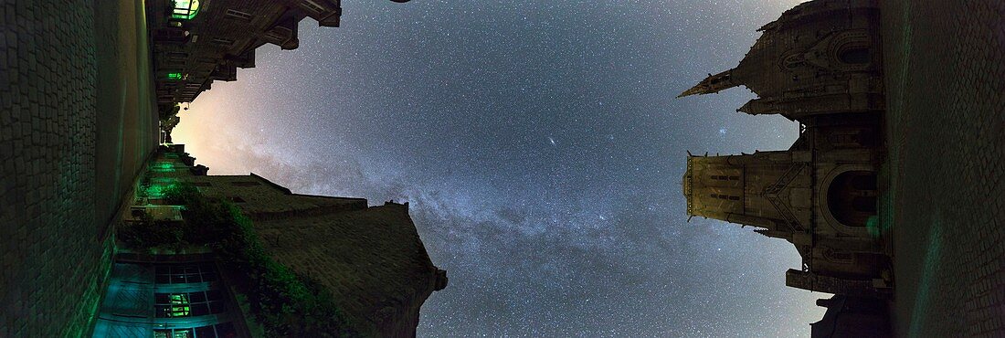 Milky Way over town,vertical panorama