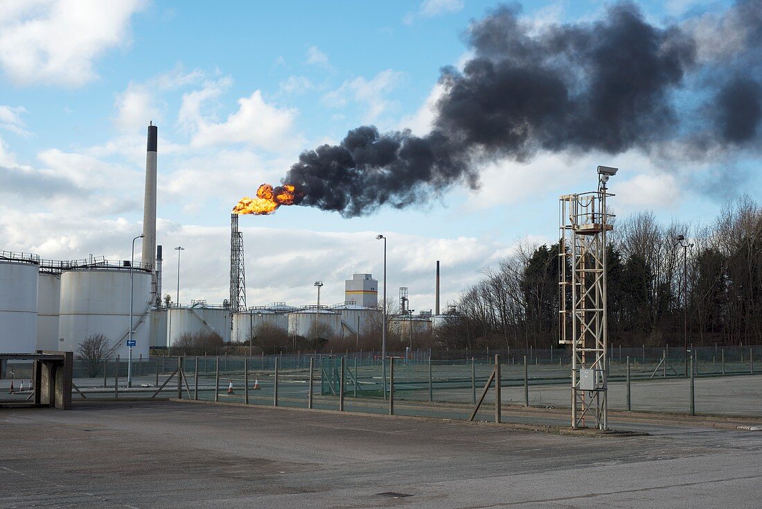 Flaming burn-off tower at oil refinery