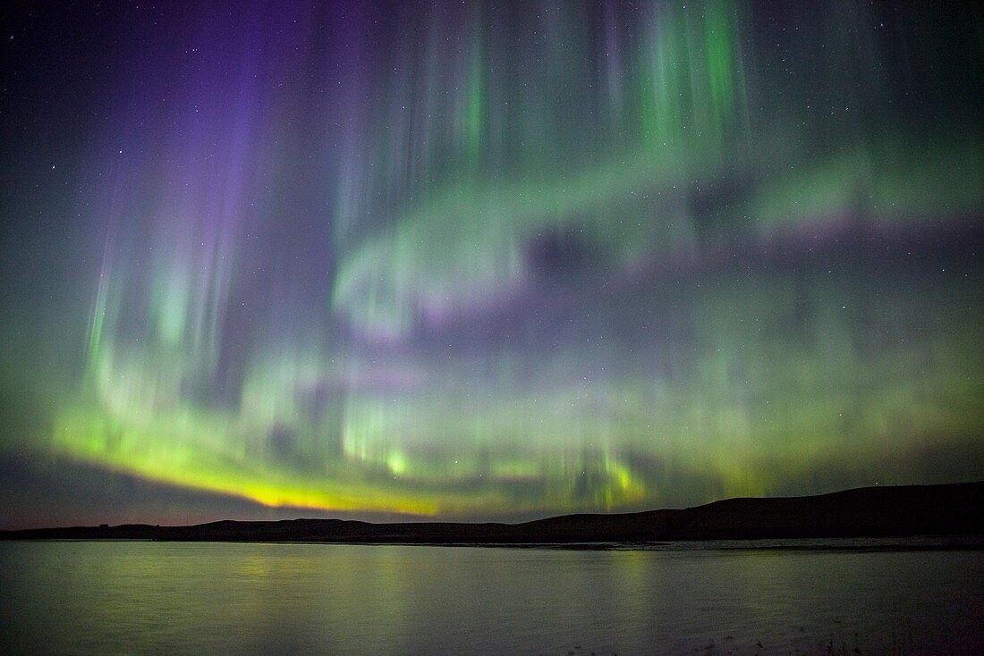 Aurora borealis over water