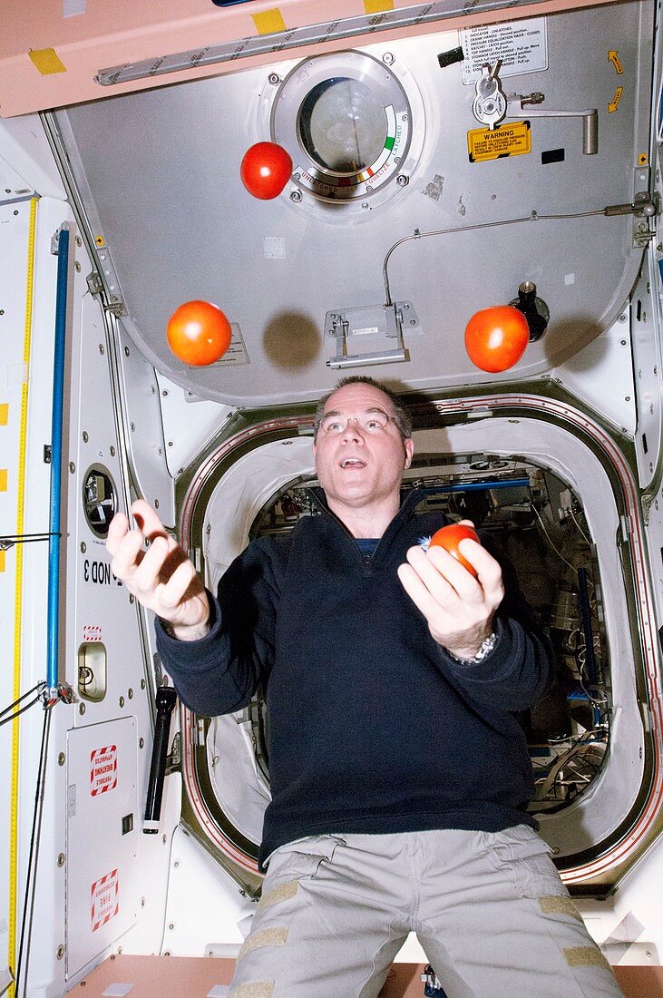 ISS astronaut juggling