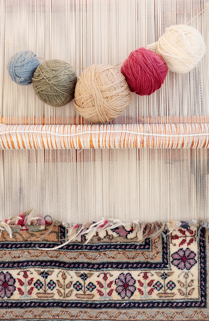 Turkish carpet being woven on a loom