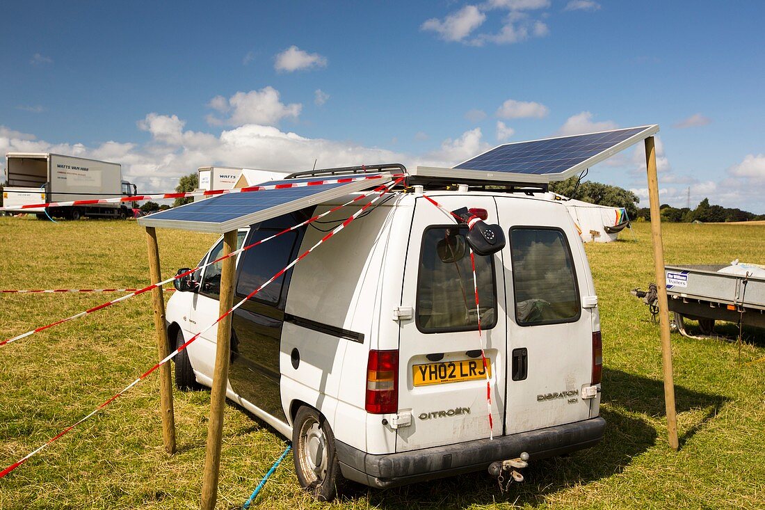 A van with solar panels attached
