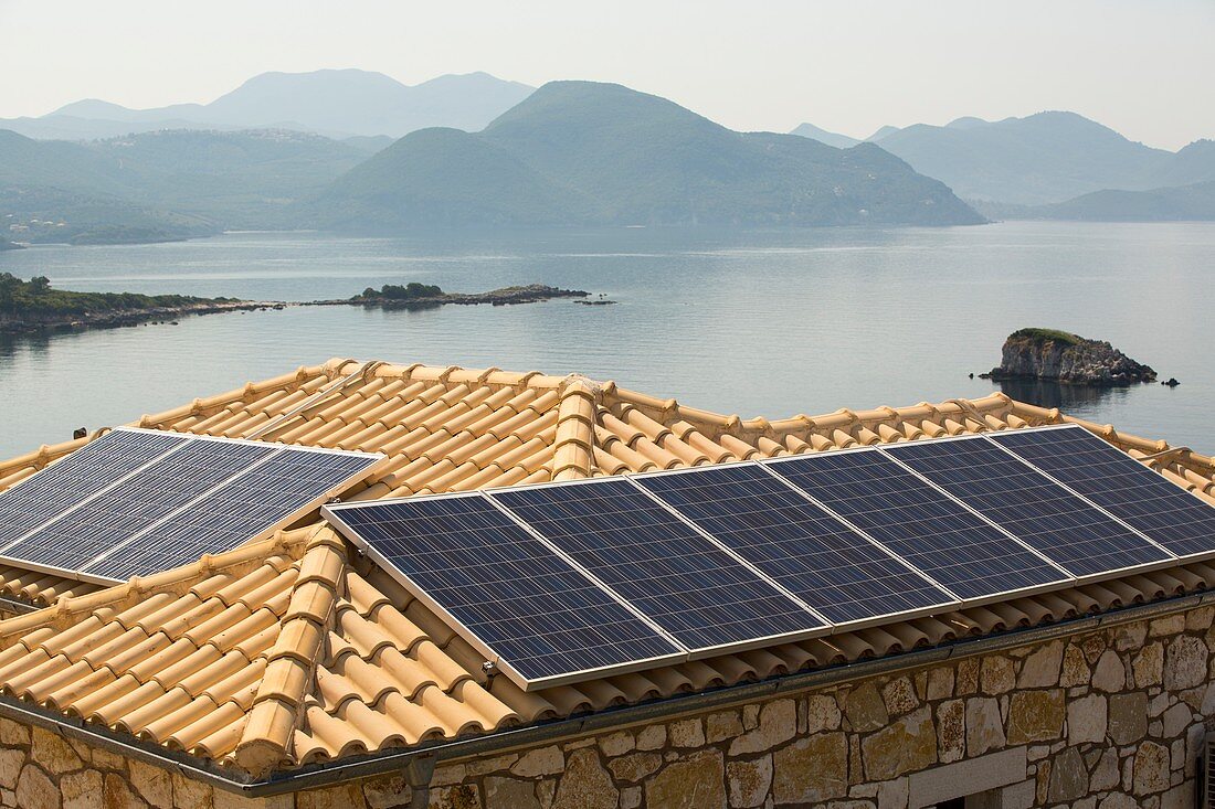 Solar panels on a house roof in Sivota