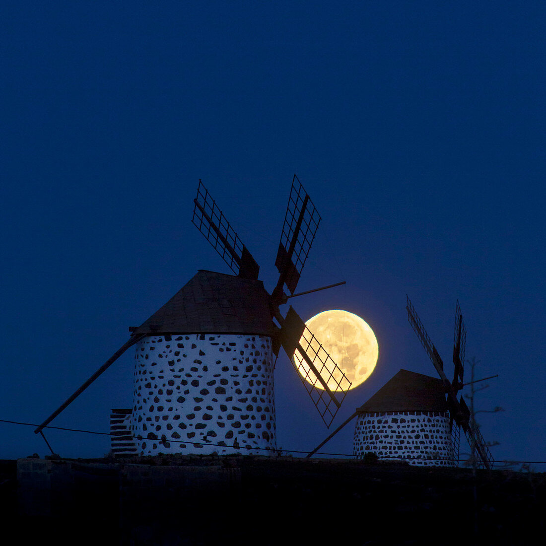 Full moon and windmills
