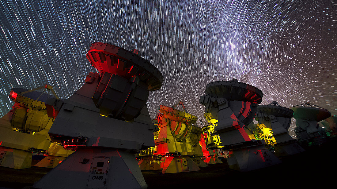 Star trails over ALMA telescopes