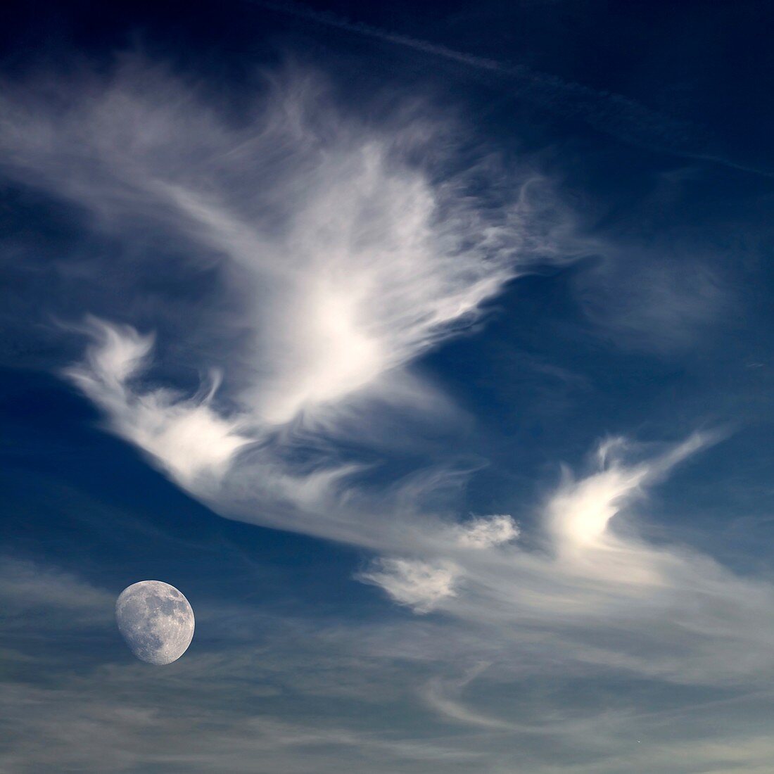 Moon in cloudy sky