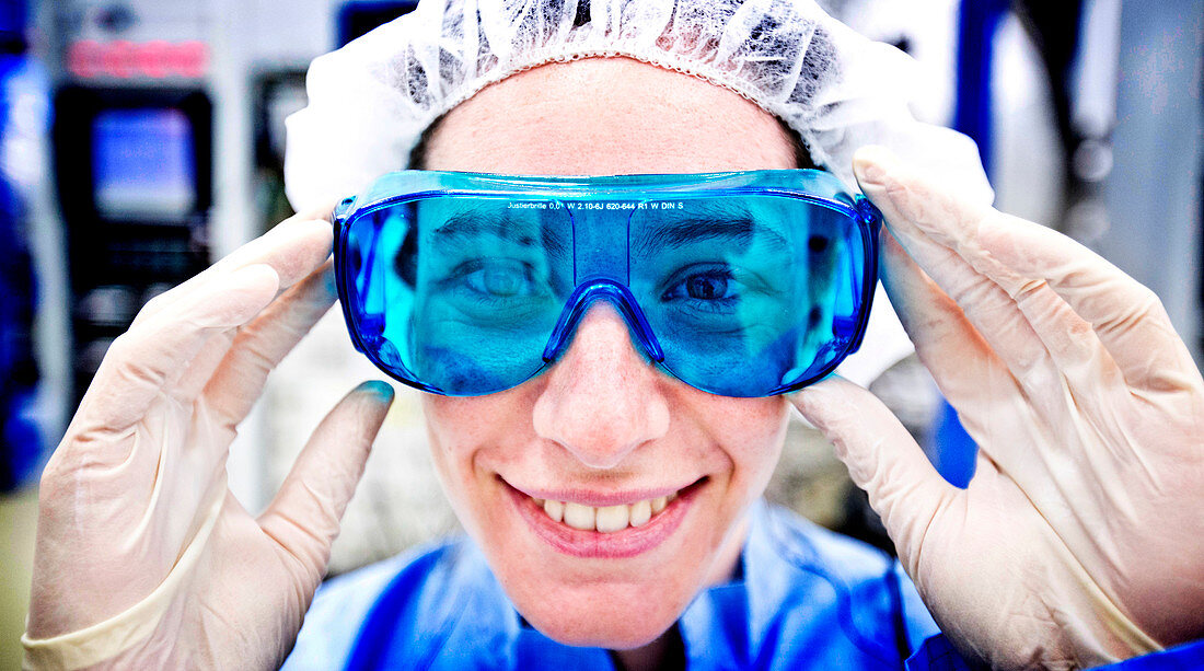 Scientist wearing protective goggles