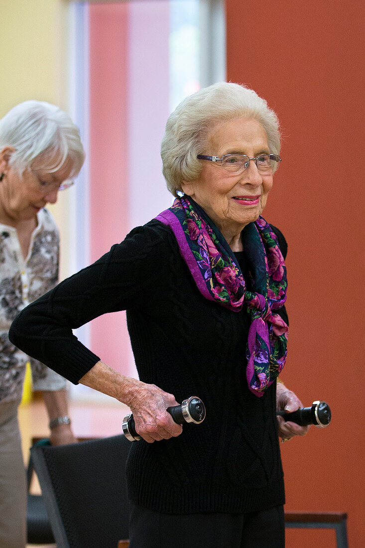 Active elderly lady exercising