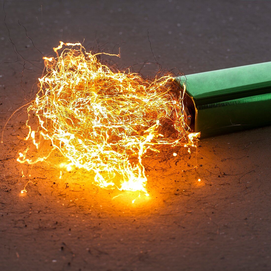 Battery and steel wool