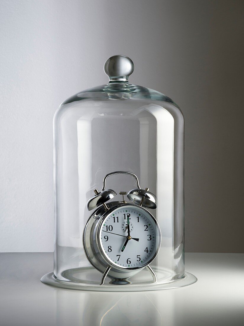 Alarm clock inside a bell jar
