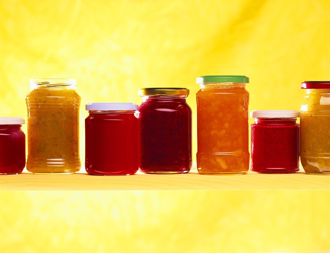 Various jam jars: strawberry and plum jams