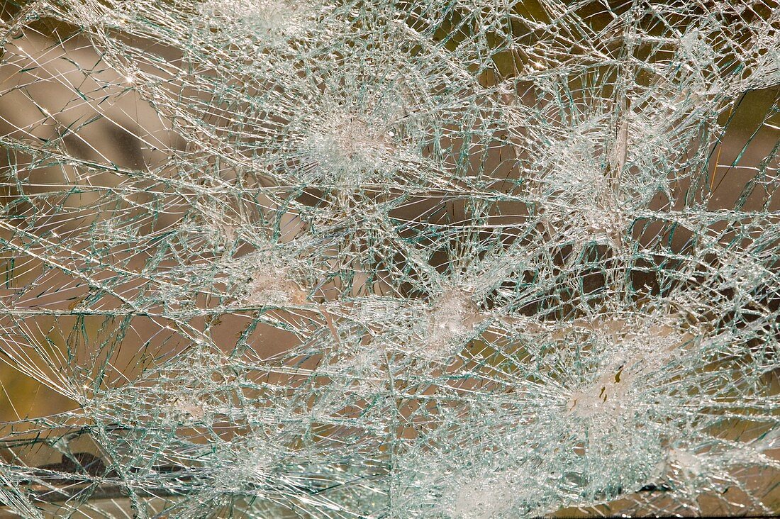 A vehicle with a smashed windscreen