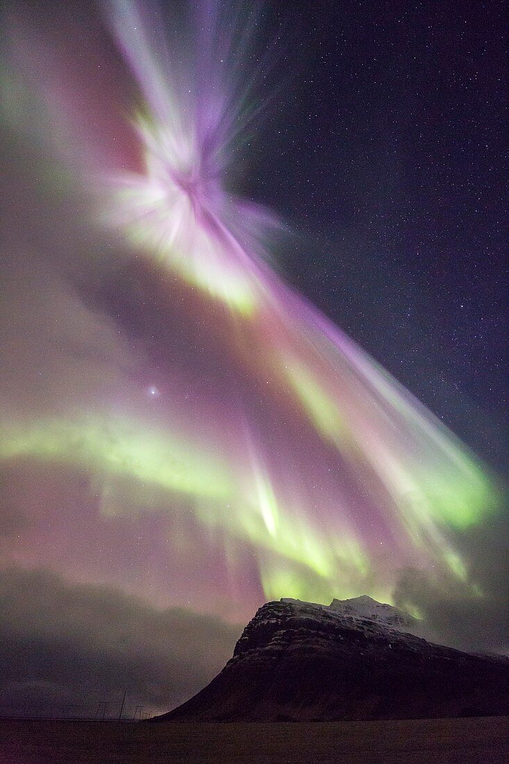 Aurora above mountain