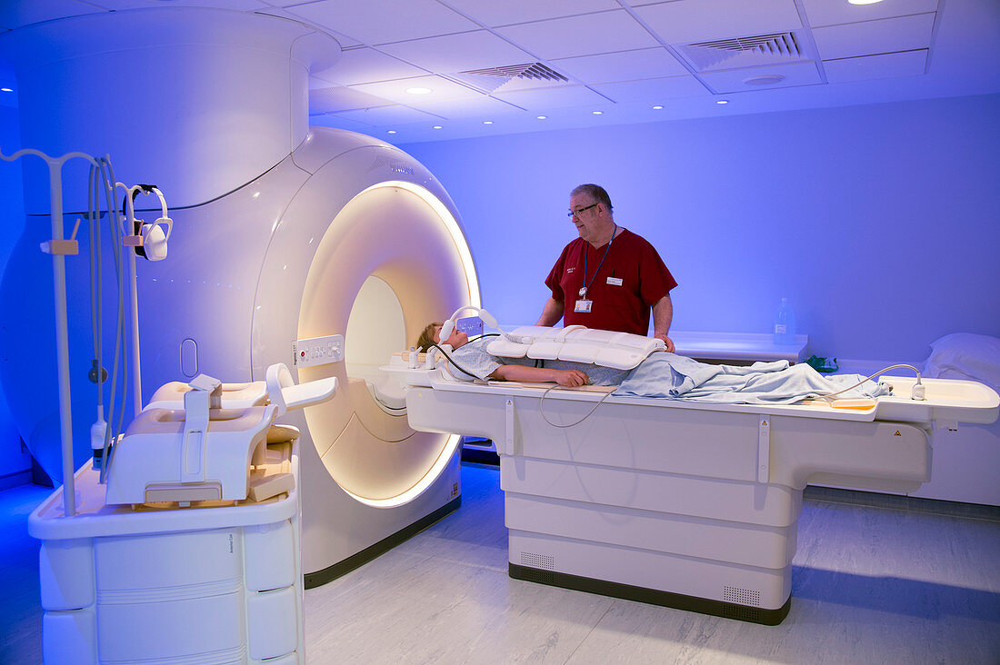 Radiographer preparing an MRI scan