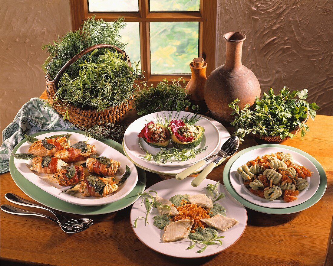 Various dishes with herbs, Italian style