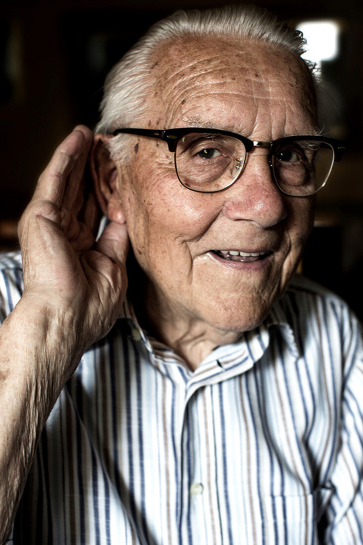 Elderly man with hearing loss