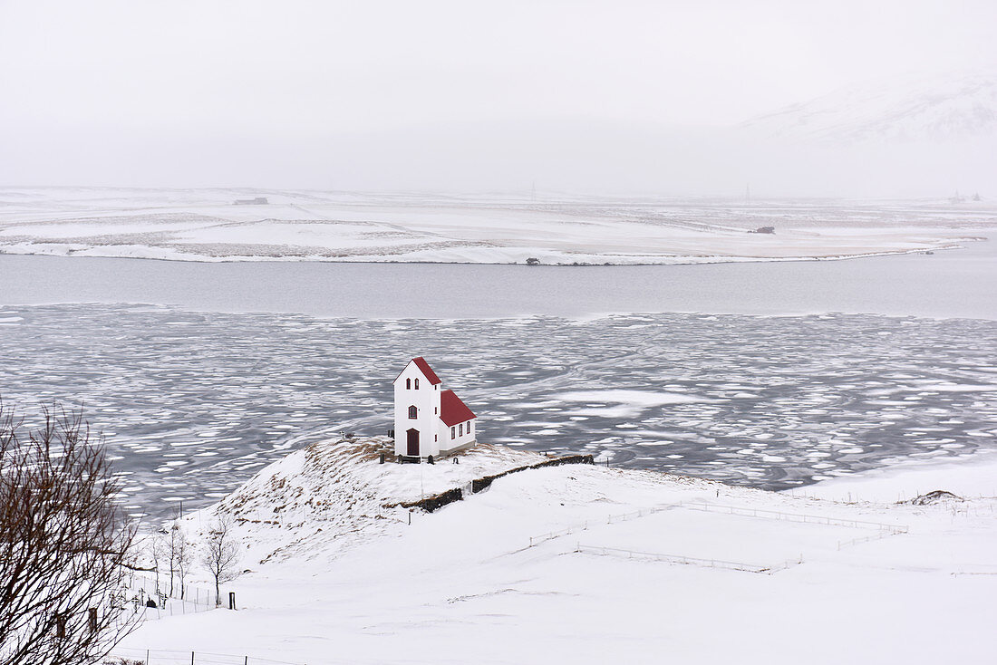 Church by a frozen lake,Iceland