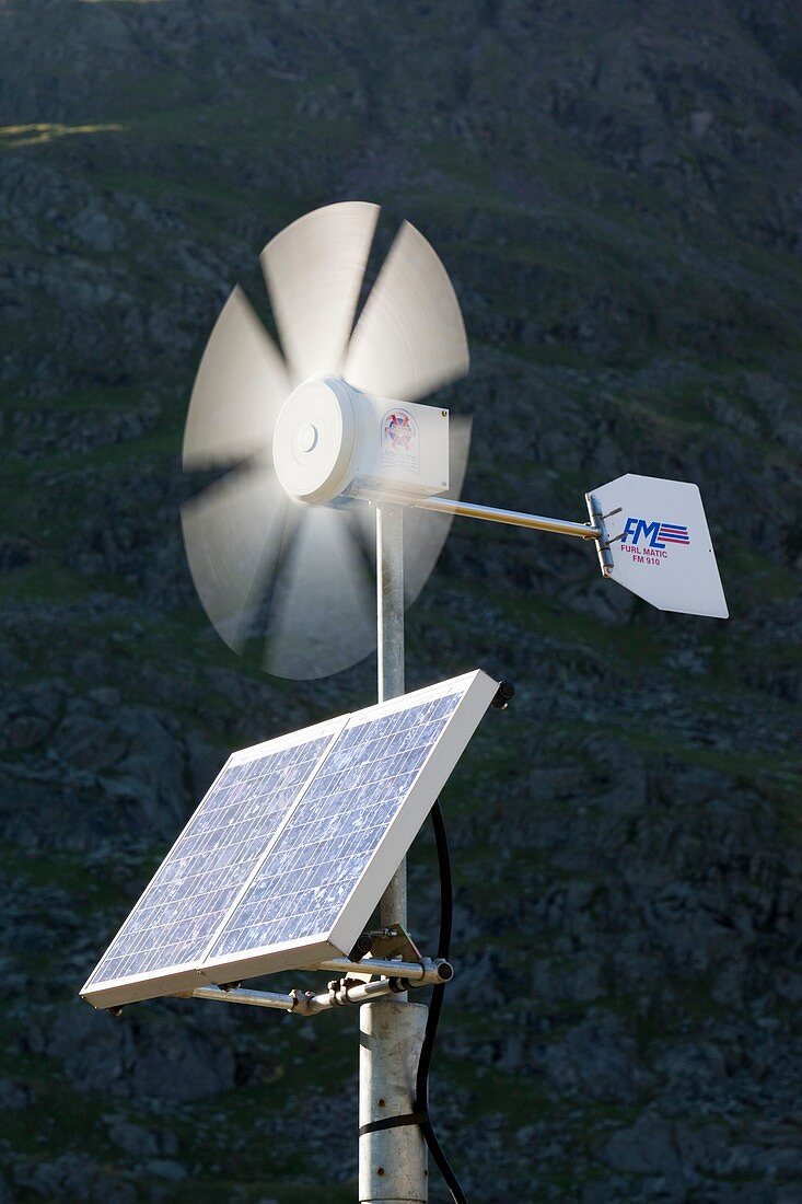 A solar electric panel and wind turbine