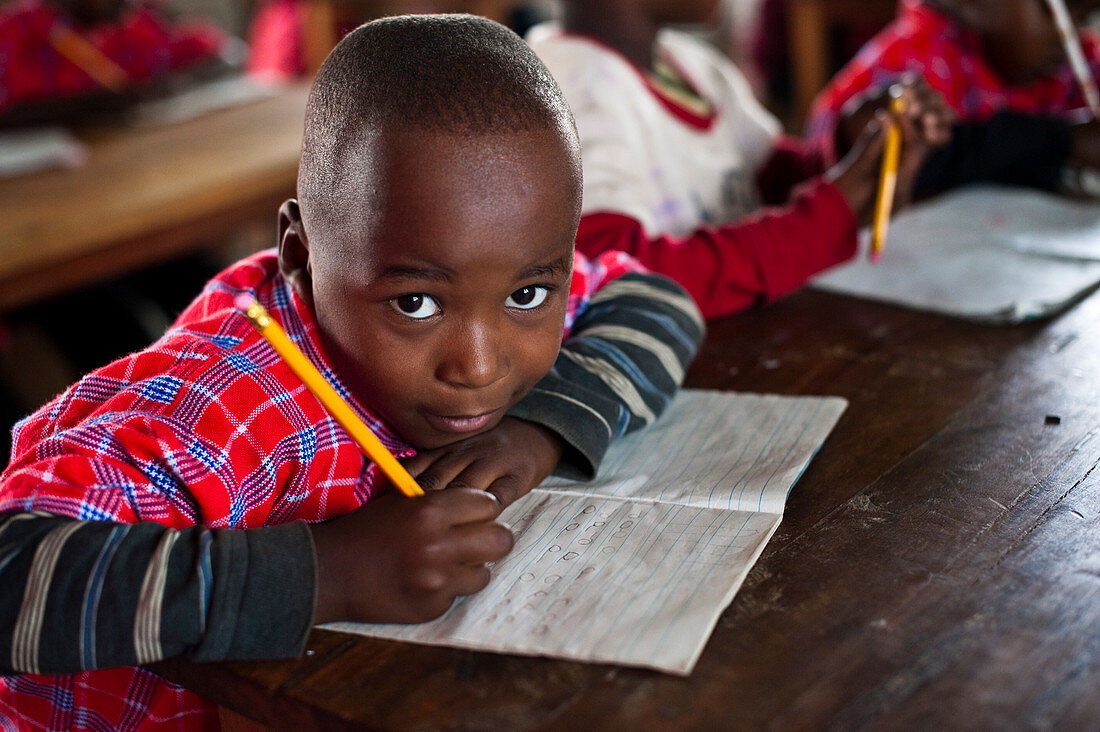 A child in a literacy class,Tanzania