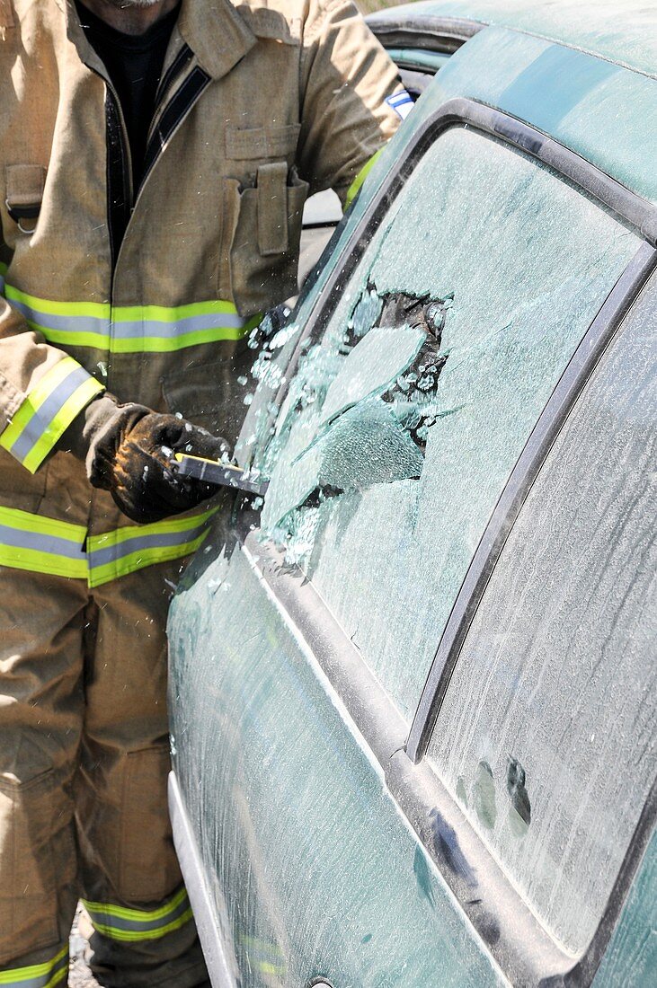 firefighters break windshield