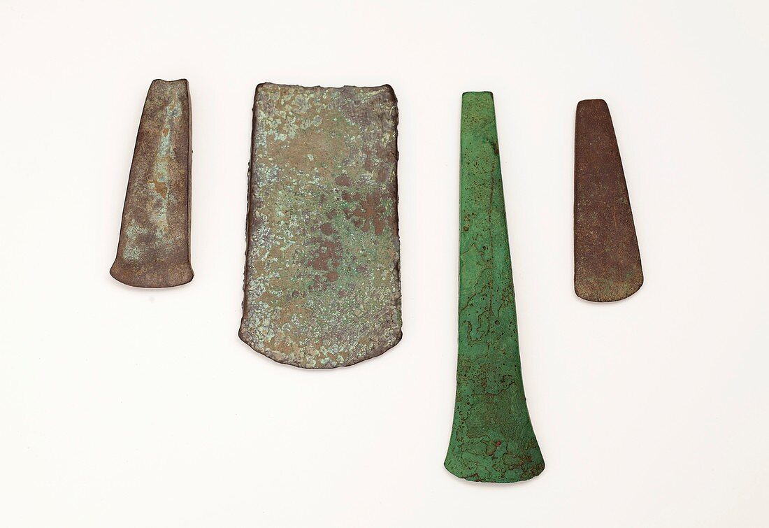 Four simple Copper age flat axe celts