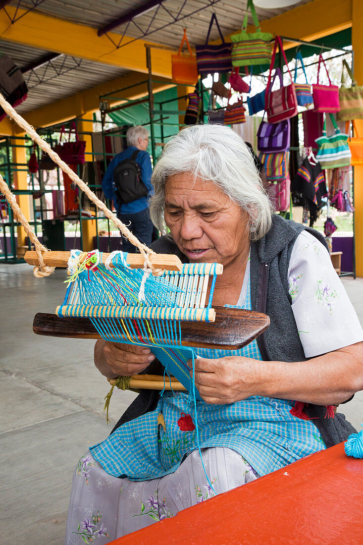 Backstrap loom weaver,Mexico