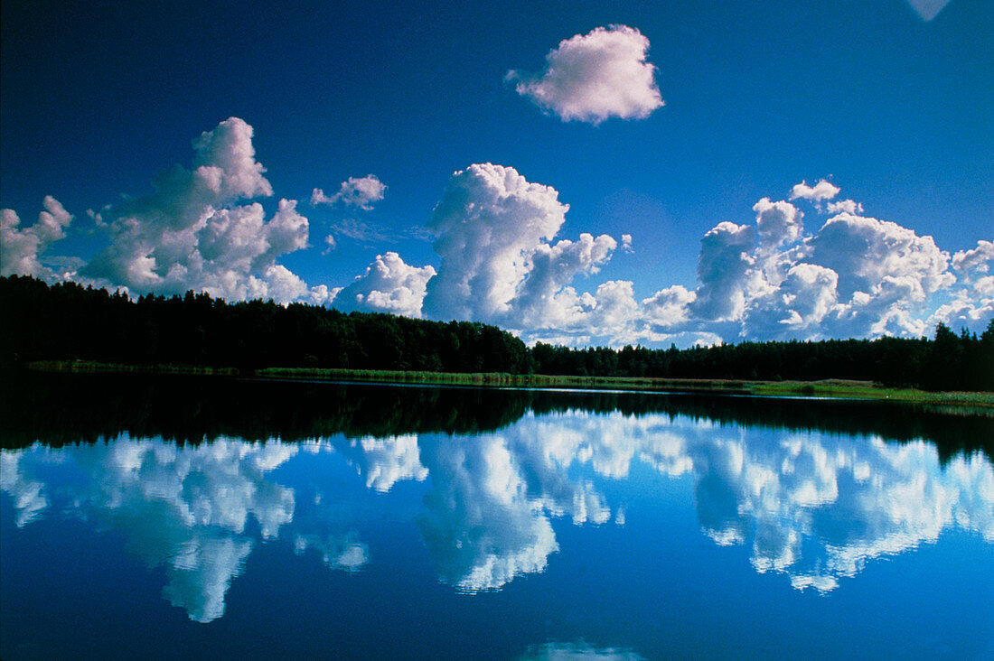 Cloud formation reflected in lake