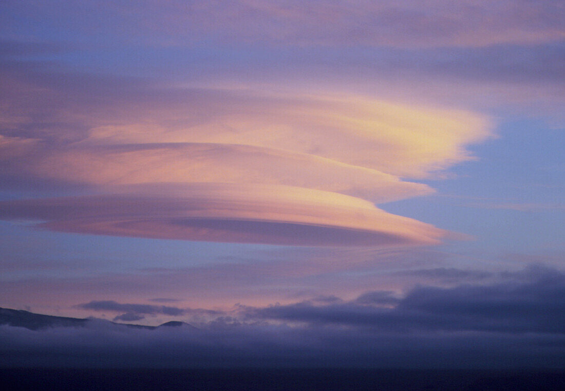 Stack of lenticular clouds over Mauna Kea,Hawaii