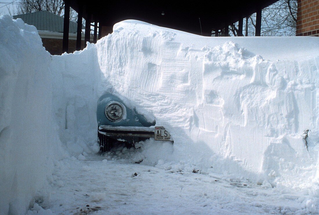 Snowdrift covering a car
