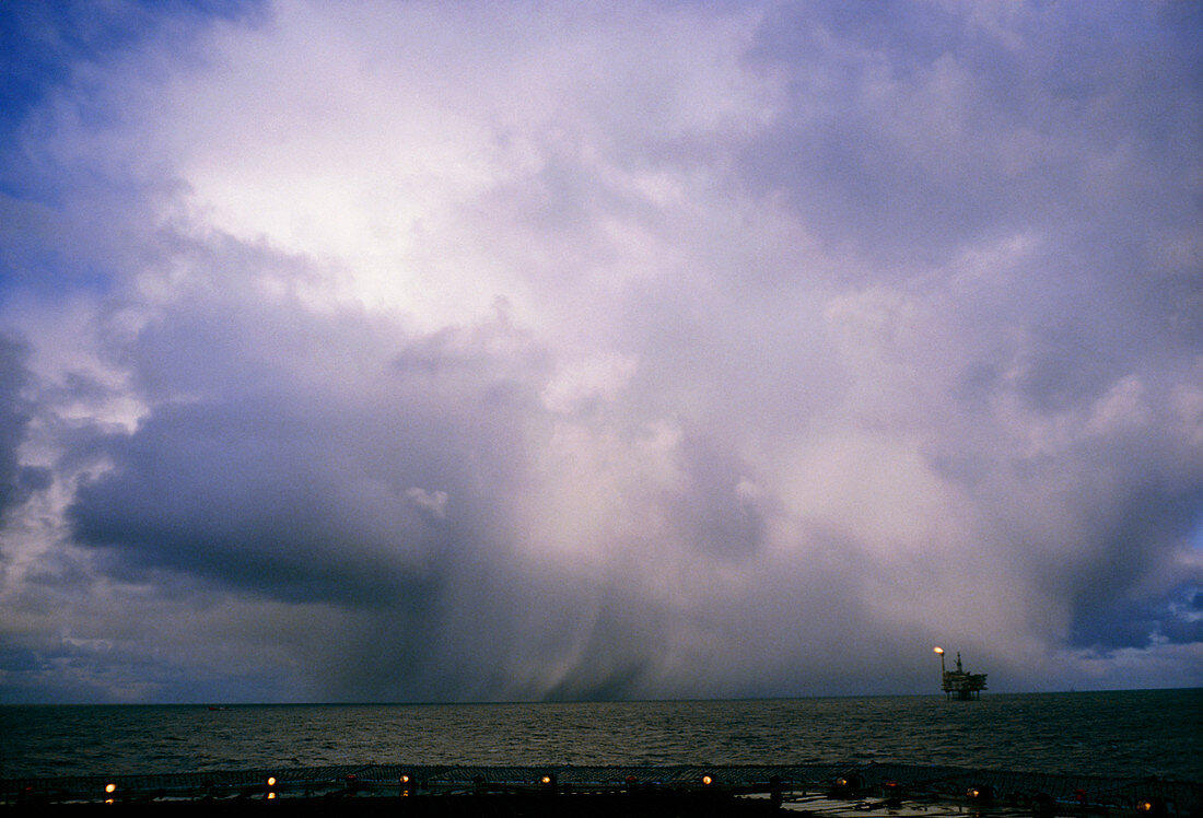 Rainstorm over an oil platform