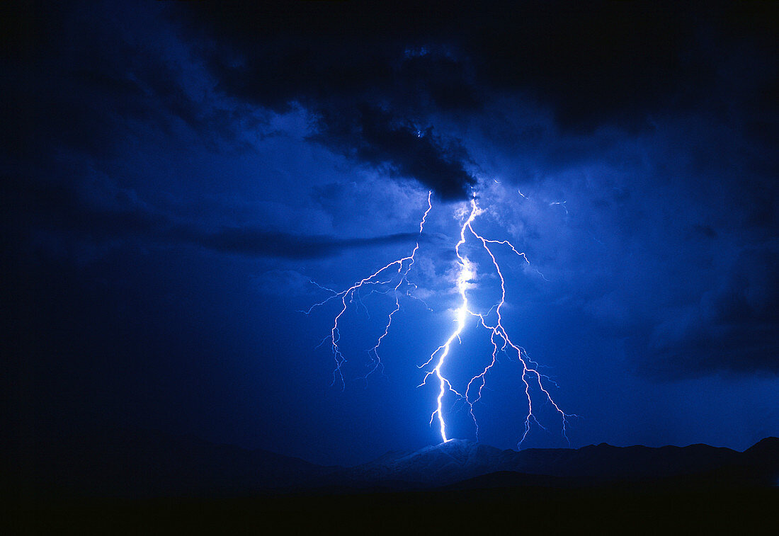 Lightning strikes mountain at night,Arizona,USA
