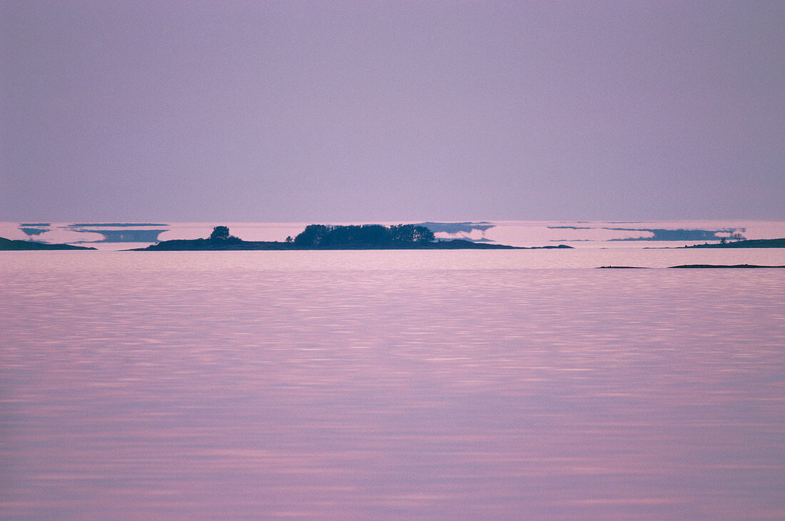 Mirage of an island over water
